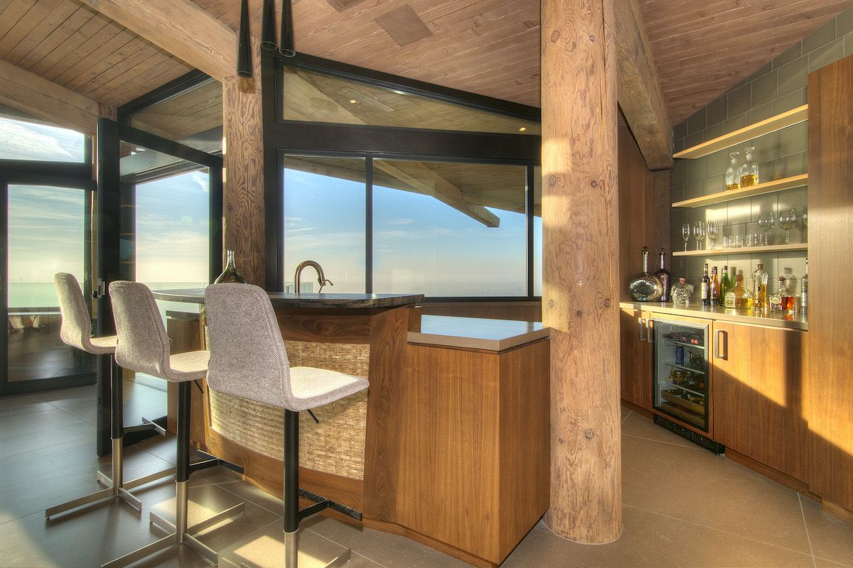 Kitchen with many windows | passive solar design | Dean Larkin Design