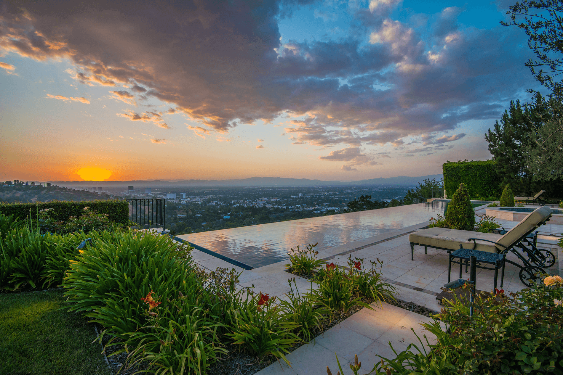 view over pool at sunset at Shahinian project, a great example of pools in architecture design projects - Dean Larkin Design