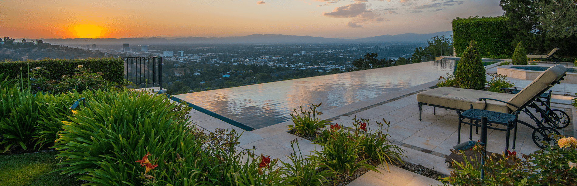 View of Los Angeles over the edge of an infinity pool - luxury custom design - Dean Larkin Design