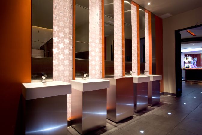 Mickys bathroom with lighted opaque panels at sinks | Lighting in Contemporary Architecture | Dean Larkin Design