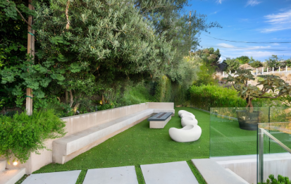 courtyard with white seating and fire table- Tigertail Project - Dean Larkin Design