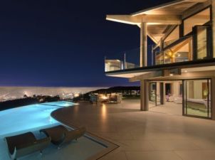 nighttime view at a gorgeous pool in architecture design project Macapa Drive -Dean Larkin Design