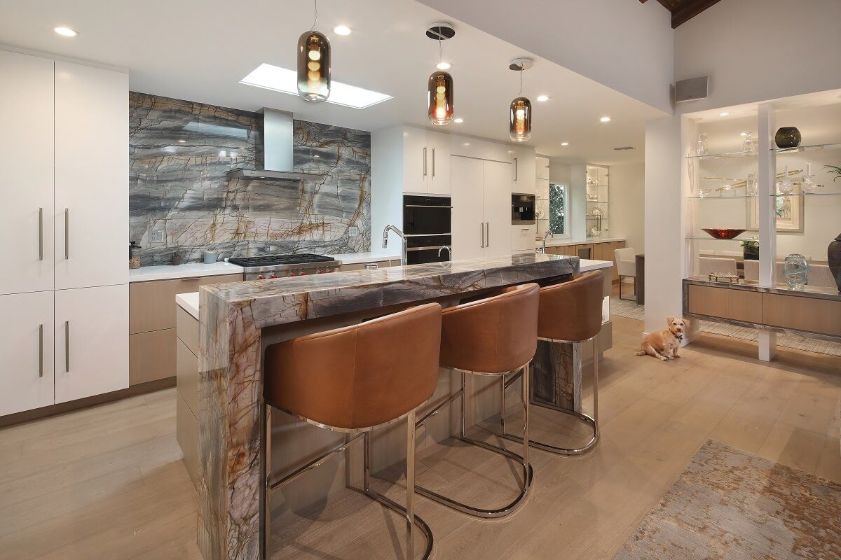 View of Picasso stone kitchen island and kitchen with Picasso stone backsplash | River Lane Project | Dean Larkin Design