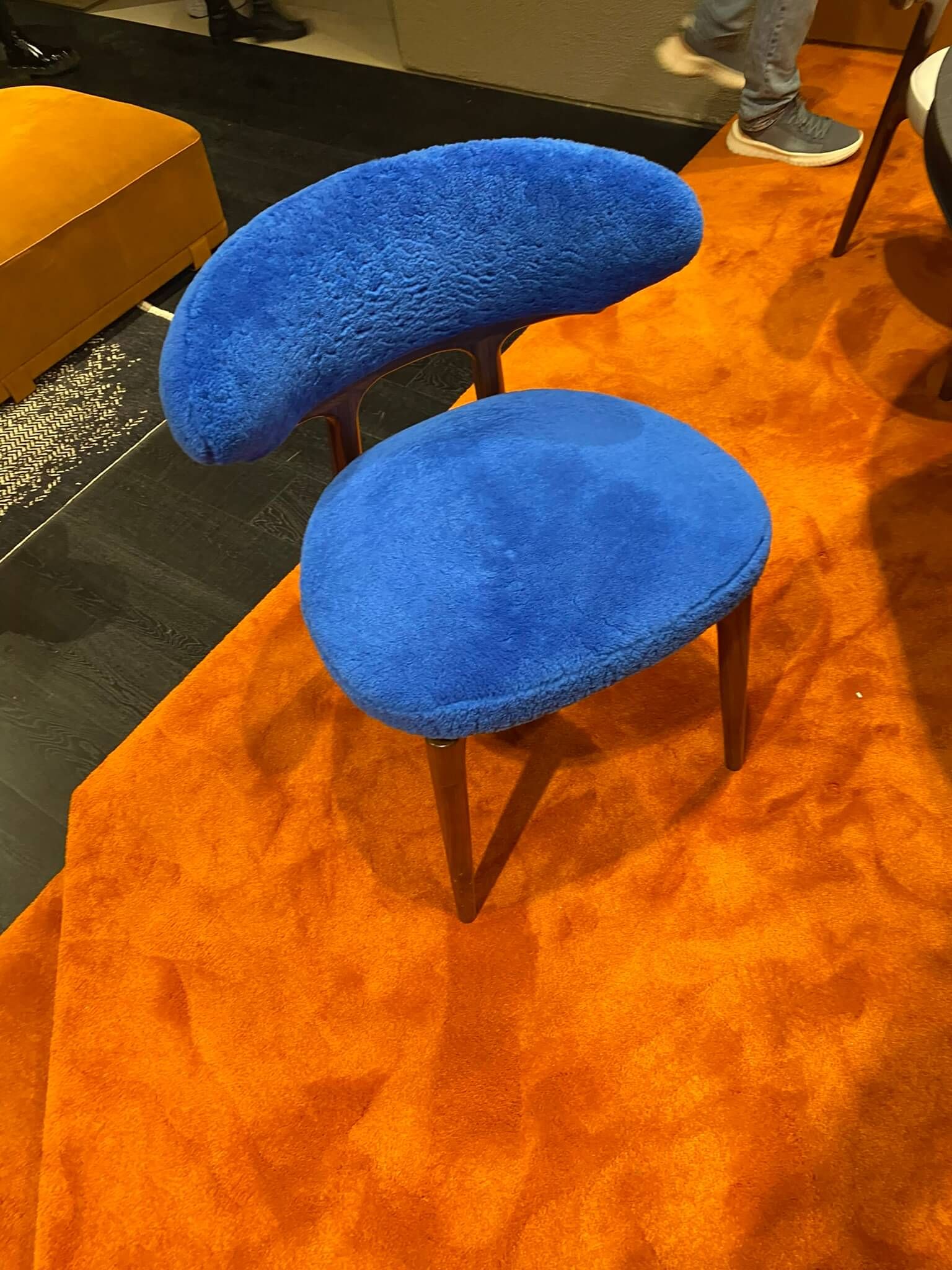 Baxter royal blue chair on orange carpet - new trends at Salone del Mobile - Dean Larkin Design