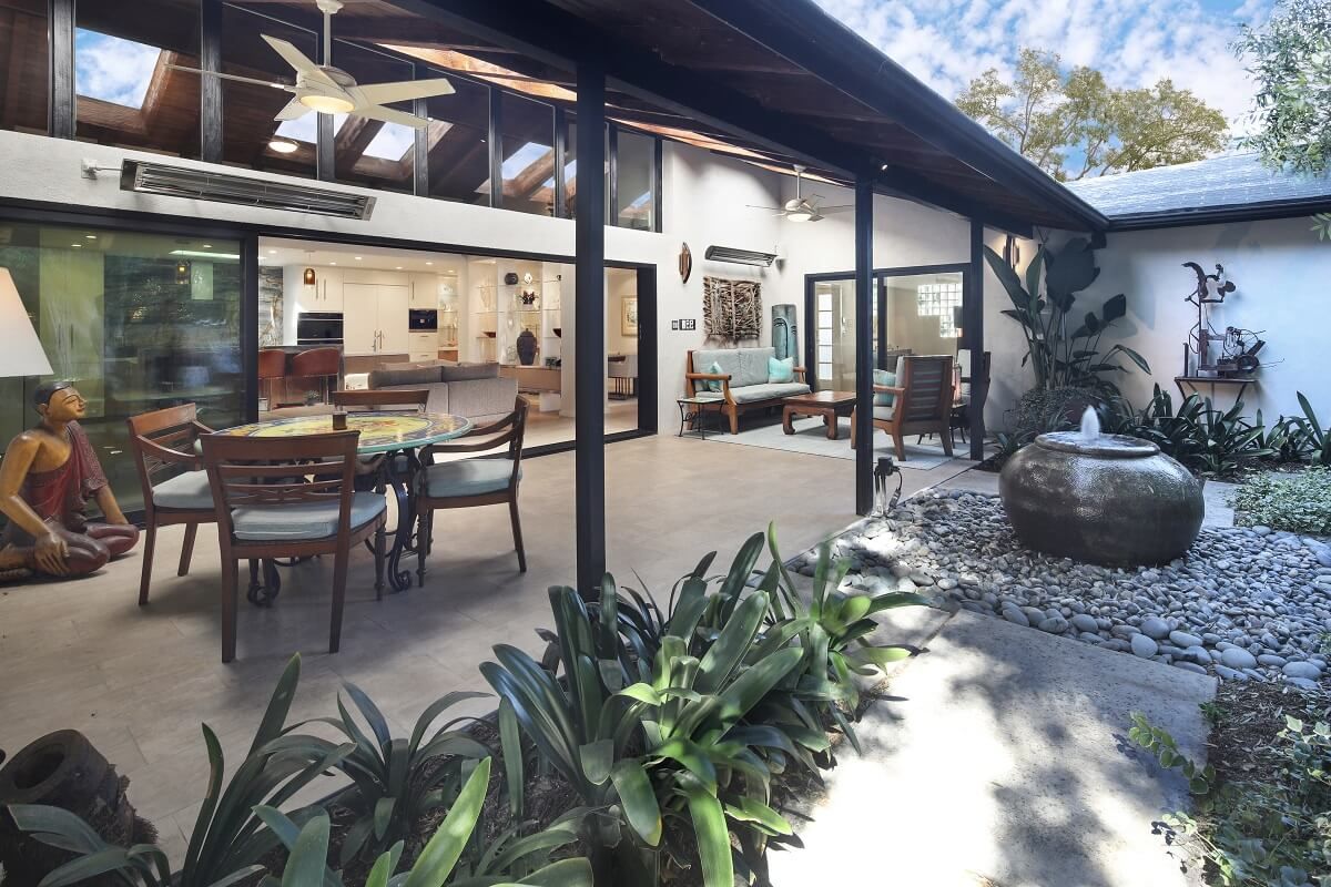 Courtyard walkway looking into loggia and living room of River Lane Project | Californai Rooms in Modern Architectural Design - Dean Larkin Design