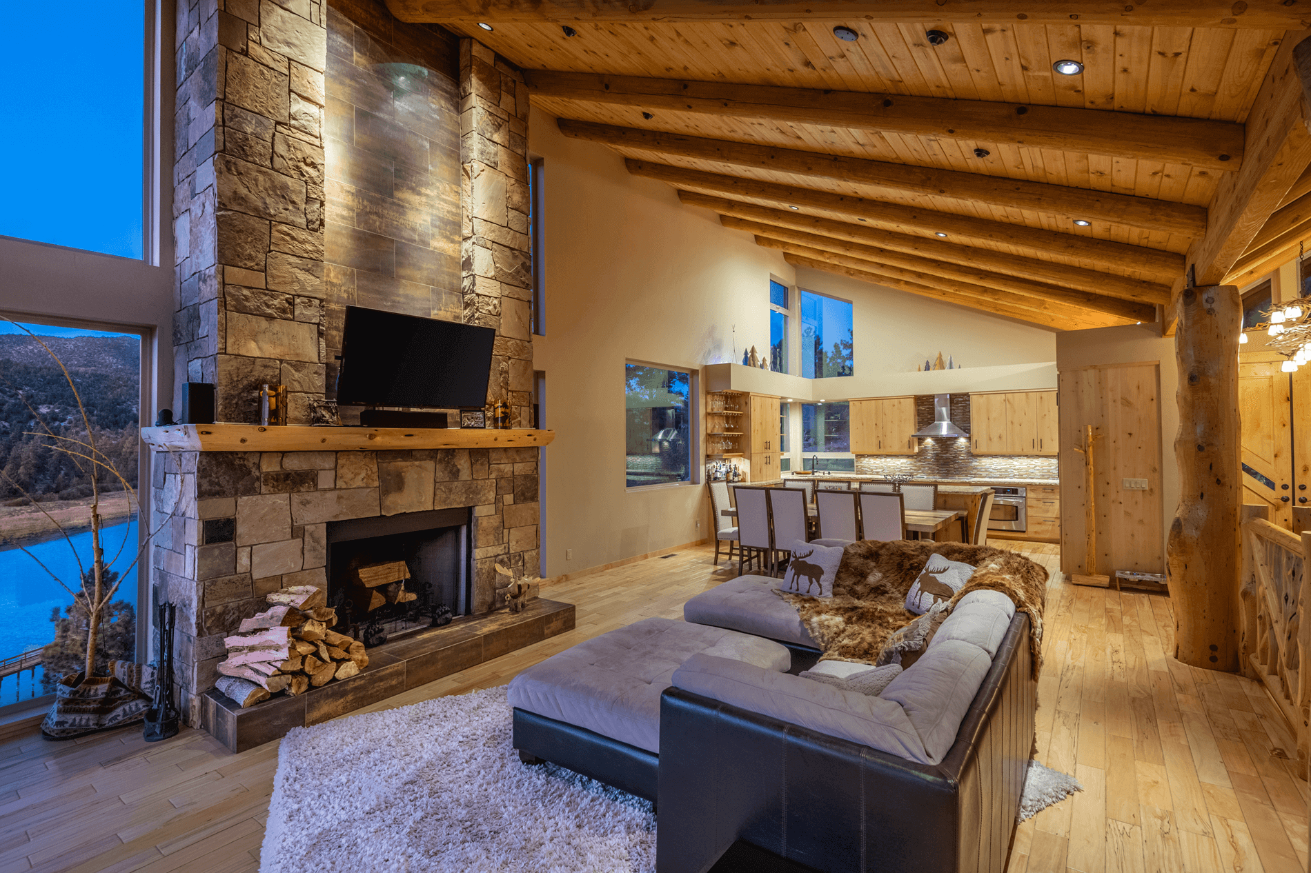 Eagle Lake Project - View of living room into kitchen with beautiful ceiling beams- Dean Larkin Design