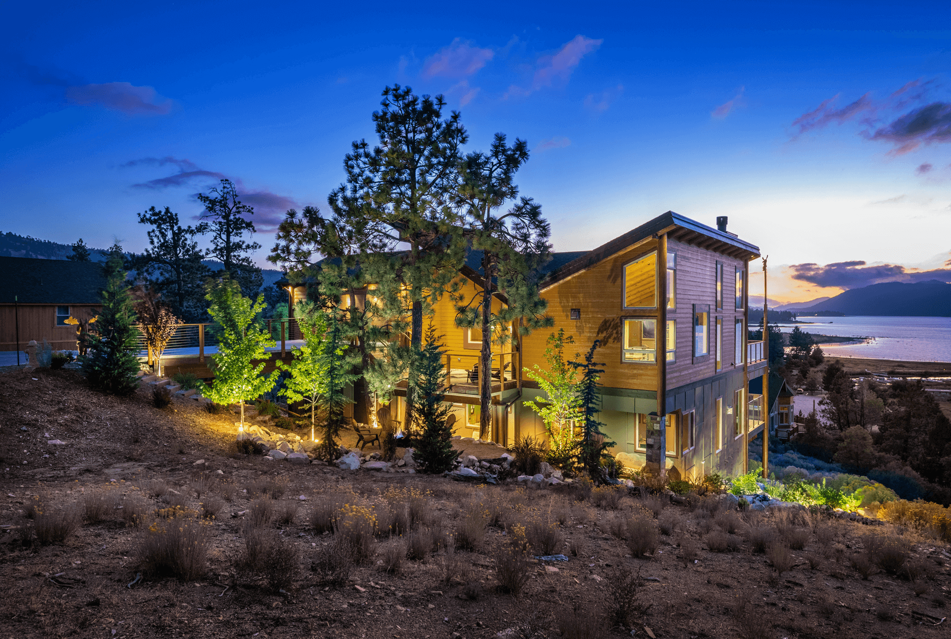 Eagle Lake Project - View of side of house and lake beyond - Dean Larkin Design