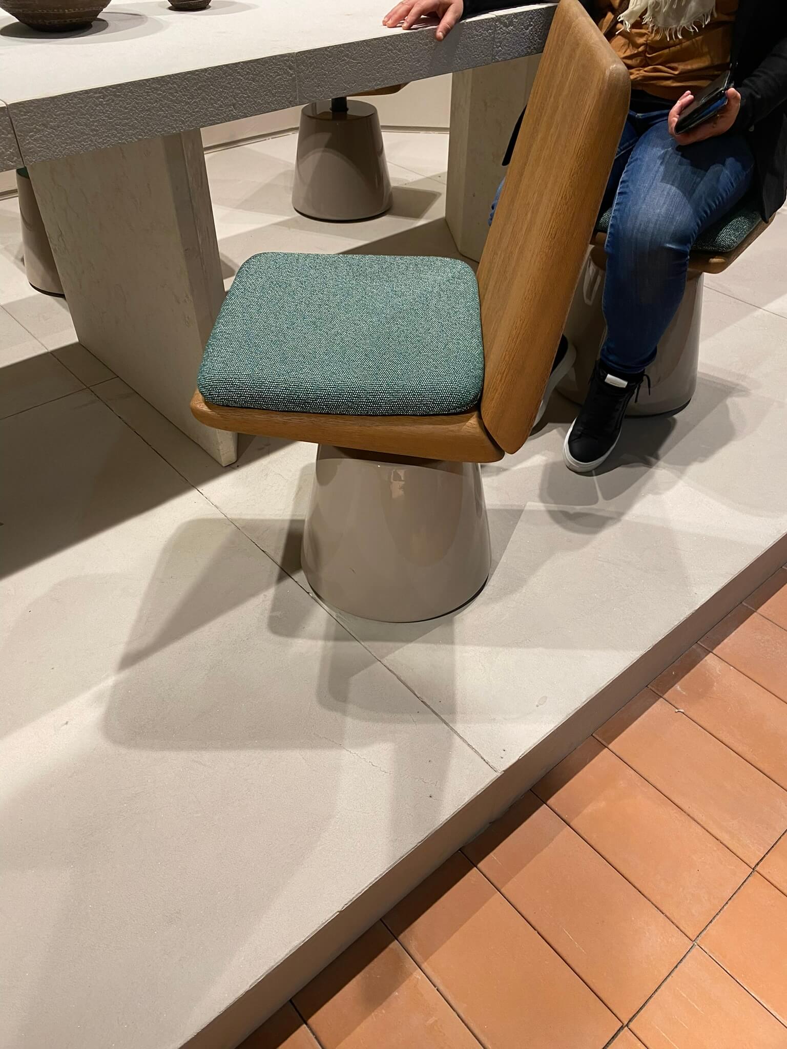 Baxter leather chair with blue-green cushion - new trends at Salone del Mobile - Dean Larkin Design