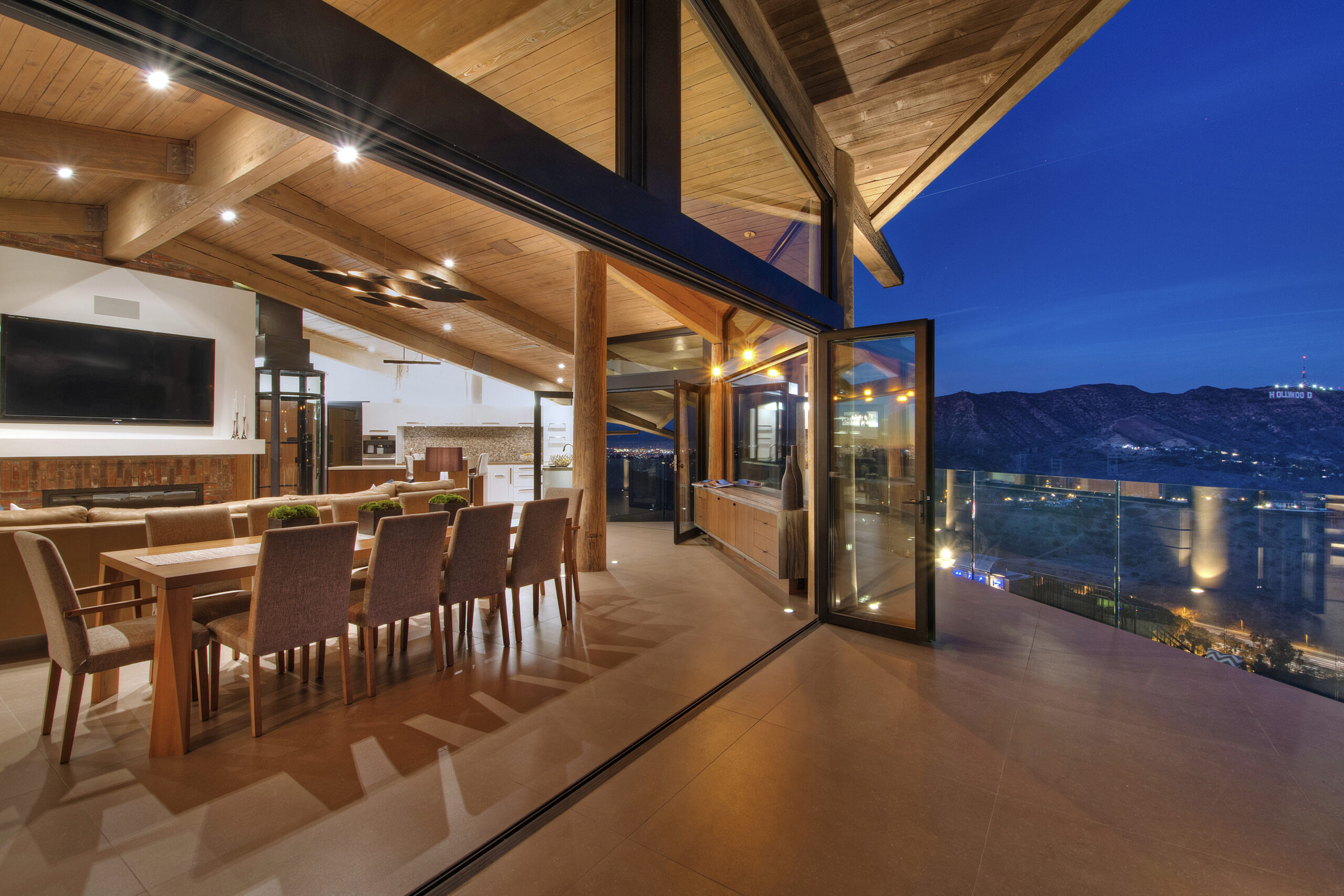 Macapa Drive dining room — organic modern architecture open to Hollywood Hills terrace, Dean Larkin Design