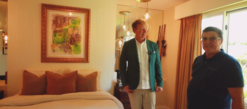 Homeowner Ron and Dean Larkin speaking in the primary bedroom of the River Lane architecture project - Dean Larkin Design